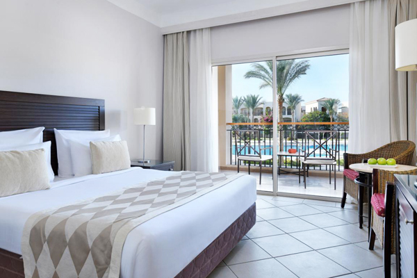 jaz-mirabel-Superior_Queen_bed_-pool_view.jpg