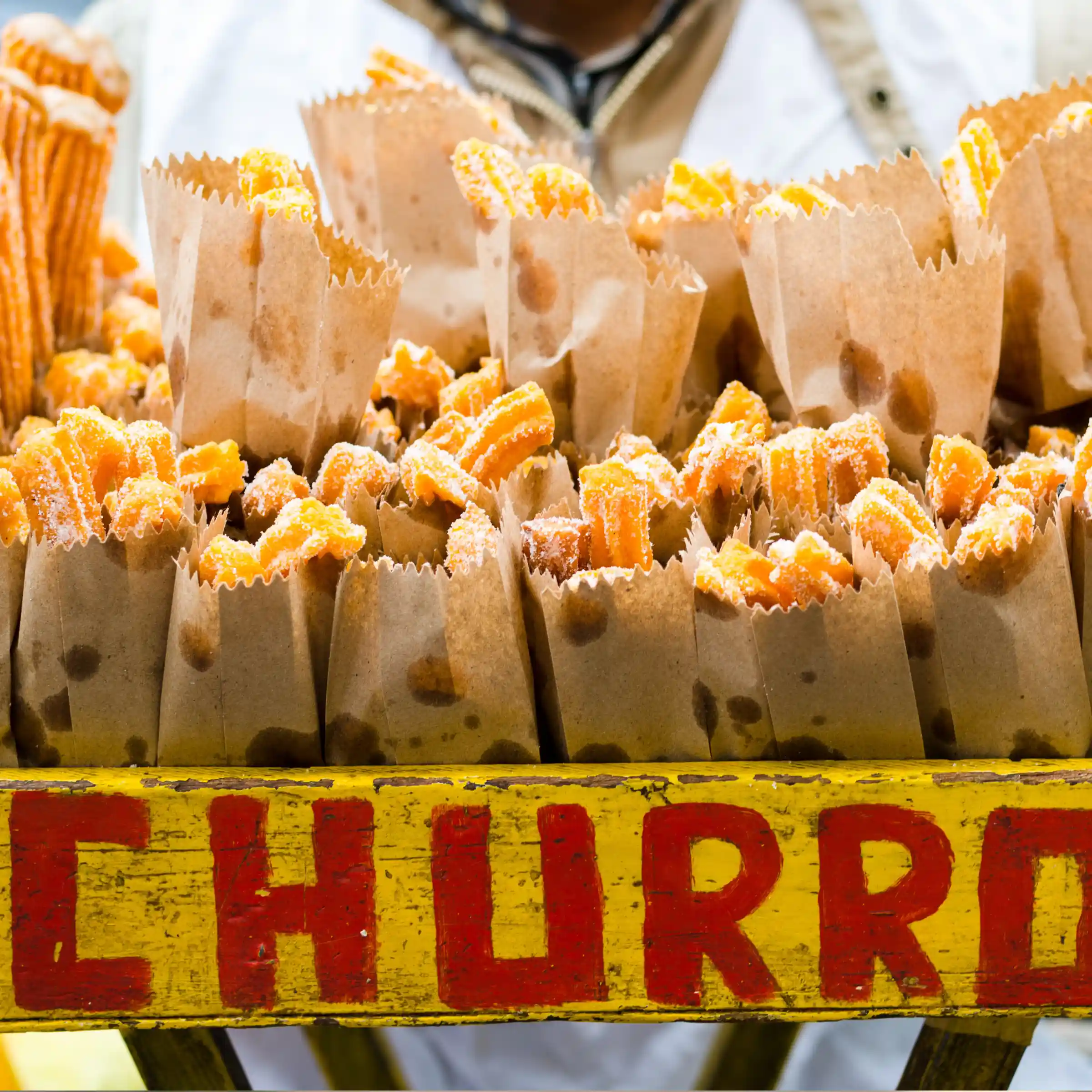 Pan sprzedający churrosy